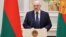 Belarusian President Alyaksandr Lukashenka speaks during a ceremony in Minsk, October 30, 2020 
