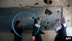 Школа в секторе Газа, разрушенная во время военного противостояния между ХАМАС и Израилем летом 2014 года 
