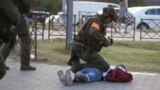 Belarus -- police shoots at journalists, Nasha Niva journalist Natallia Lubnieuskaja wounded