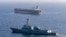 This US Navy handout photo released on May 7, 2026 by US Central Command Public Affairs, shows the Arleigh Burke-class guided-missile destroyer USS Rafael Peralta (DDG 115) implementing a maritime blockade against the Iran-flagged crude oil tanker vessel 