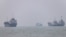 Vessels in the Strait of Hormuz near the beach of Bandar Abbas