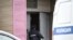 RUSSIA -- A police officer enters a building at the City Clinical Emergency Hospital Number 1 where Russian opposition leader Aleksei Navalny was admitted after suffering severe symptoms of what his spokeswoman called poisoning, in Omsk, August 20, 2020