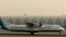 A French-made ATR-72 owned by Iran's Aseman Airlines sits on the tarmac at Dubai airport on July 29, 2008. AFP PHOTO/MARWAN NAAMANI / AFP PHOTO / MARWAN NAAMANI