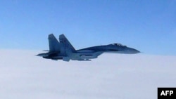 Japan -- A Russian fighter jet SU-27 encroaches on Japanese territorial airspace, 07Feb2013