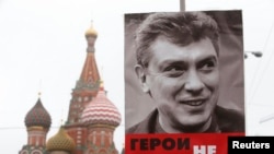 Портрет убитого Бориса Немцова на памятной акции в Москве 1 марта 