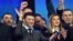 UKRAINE -- Presidential candidate Volodymyr Zelenskiy (C) and his wife Olena together with members of his crew react during a presidential election debate with Ukraine's current President at The Olympic Stadium in Kyiv, April 19, 2019