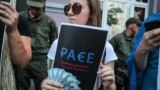 UKRAINE – Ukrainian activists shout slogans during a rally against Russia's return to the Parliamentary Assembly of the Council of Europe (PACE), in front the Italian embassy, in Kyiv, 25 June 2019