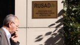 RUSSIA -- A man walks past a sign outside the office of Russian Anti-Doping Agency (RUSADA) in Moscow, September 20, 2018