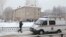 RUSSIA -- A vehicle of the Russian Emergencies Ministry is parked near a local school after reportedly several unidentified people wearing masks injured schoolchildren with knives in the city of Perm, January 15, 2018