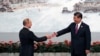 CHINA -- Chinese President Xi Jinping shakes hand with Russian President Vladimir Putin before the welcoming banquet for the BRICS (Brazil, Russia, India, China and South Africa) Summit, in Xiamen, China September 4, 2017.