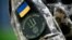 UKRAINE – The insigna of the International Legion for the Defence of Ukraine (LIDU) on the jacket of LIDU's spokesman in the Ukrainian capital Kyiv, amid the Russian invasion of Ukraine. Kyiv, June 8, 2022