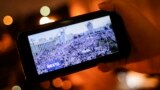 BELARUS -- A man looks at Telegram channel NEXTA Live on his smartphone in Minsk, August 19, 2020