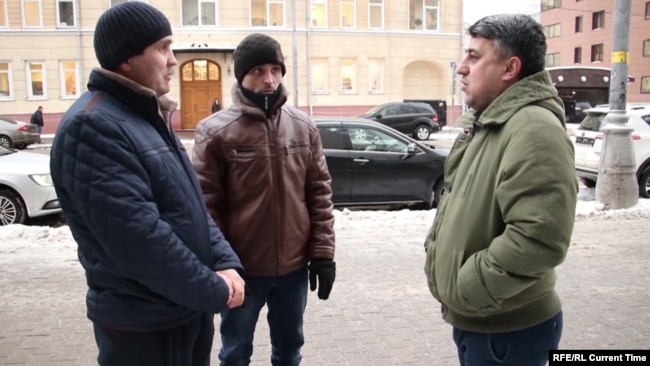 Братья с правозащитником Каримджаном Ёровым