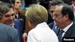 Премьер-министр Греции Алексис Ципрас встретился с канцлером Германии Ангелой Меркель и президентом Франции Франсуа Олландом. Брюссель, 12 июля 2015