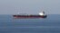 FILE PHOTO: Oil tankers pass through the Strait of Hormuz