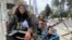 Members of Taliban forces sit at a checkpost in Kabul, Afghanistan