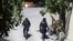 HAITI -- Police officers walk near the private residence of Haiti's President Jovenel Moise after he was shot dead by gunmen with assault rifles, in Port-au-Prince, Haiti July 7, 2021. REUTERS/Estailove St-Val NO RESALES. NO ARCHIVES