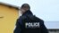 Police officers work to collect evidence at the site of a bladed weapon attack where a man is suspected of killing one person and wounding two municipal police officers in Mulhouse, eastern France on February 22, 2025.