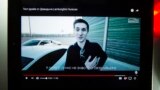 RUSSIA -- A tablet shows archive Youtube footage featuring Yevgeny Nikulin after a Lamborghini Huracan race outside Moscow, July 25, 2017