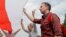 BELARUS -- People gather outside a detention center to support Syarhei Tsikhanouski