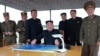 Газета Северной Кореи опубликовала фото Ким Чен Ына на фоне запуска ракет