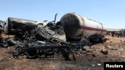 Последствия взрыва грузовика в Сирии (город Турманин) 