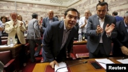Премьер-министр Греции Алексис Ципрас прибыл на заседание в парламент. Афины, 10 июля 2015 
