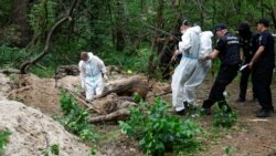 Криминалисты эксгумируют тела семи убитых возле поселка Ворзель возле Бучи 13 июня 2022 года