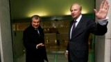 U.K. -- British Petroleum CEO Bob Dudley (R) and Rosneft CEO Igor Sechin arrive outside the BP headquarters in central London, March 21, 2013