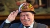 Poland -- Former President of Poland Lech Walesa poses for a picture wearing a Euromaidan helmet during a ceremony in Gdansk, September 29, 2014