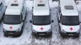 Russia, Moscow, Shmitovskiy proezd 11 march 2018 Ambulance, car parking, red cross, medicine, city, winter, top view
