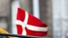 Denmark -- European and a Danish flags fly on a bus in Copenhagen, 02Jan2011