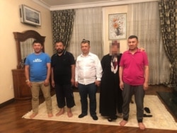 Братья Абдукадыр. Слева направо: Алимуджан Хадир, Наби Хадир, Маймаитили Хадир и Хабибула Абдукадыр. Фото: OCCRP