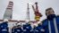 Russia -- Gazprom workers stand at the Prirazlomnoye oil platform located in the Pechora Sea, in the northwestern Arkhangelsk region, September 15, 201