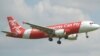 Поиски пропавшего самолета AirAsia приостановлены