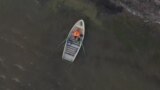 russia-postman-boat-island videograb