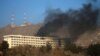 Smoke rises from the Intercontinental Hotel during an attack in Kabul, Afghanistan January 21, 2018. 