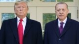 U.S. -- US President Donald Trump greets Turkey's President Recep Tayyip Erdo?an(L) upon arrival outside the White House in Washington, DC on November 13, 2019. - 