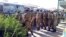 Turkmenistan -- Soldiers on the bus stop. People. Line. Turkmenabat. July 16, 2014