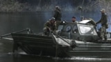 Украинские военные на реке в Донецкой области, 2 октября, 2022 г. 