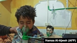 Сирийский мальчик в больнице после химической атаки в Восточной Гуте 25 февраля 2018 года