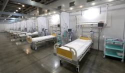 Временный госпиталь для пациентов с COVID-19 в "Крокус Экспо". Фото: ТАСС