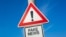 Generic – Fake News - traffic sign with exclamation mark to alert, warn caution - precaution and warning of false information, hoax, disinformation