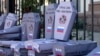 Символические картонные гробы возле посольства России в Украине, Киев, 2 июня 2018 года