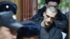 За поджог двери ФСБ суд приговорил Павленского к штрафу и компенсацию ущерба