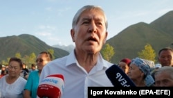 Kyrgyz ex-President Almazbek Atambaev attends a meeting with his supporters in the village of Koi-Tash on July 19, 2019.