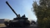 На Востоке Украины отводят вооружения 