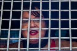 Юлия Галямина после задержания на акции в защиту арестованного журналиста и муниципального депутата Ильи Азара, 29 мая 2020 года. Фото: AP