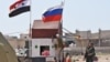 РБК и Ведомости назвали имена трех погибших в Сирии российских военных. Минобороны их смерть отрицало