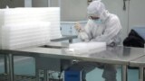 Guangzhou, Guangdong province, China - A technician works in a laboratory for manufacturing testing kits for the new coronavirus at a medical laboratory company Da An Gene Co, as the country is hit by an outbreak of the new coronavirus.